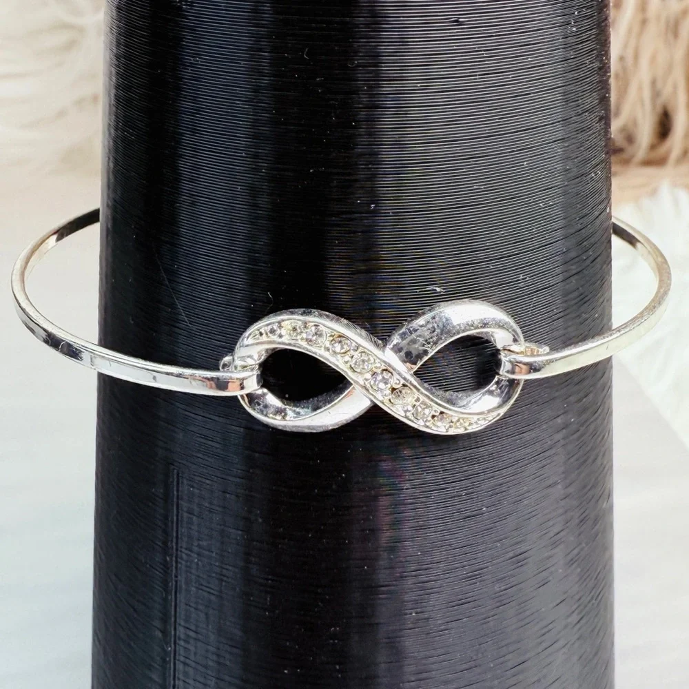 Silvertone bling accent Infinity Bracelet - Picture 4 of 11